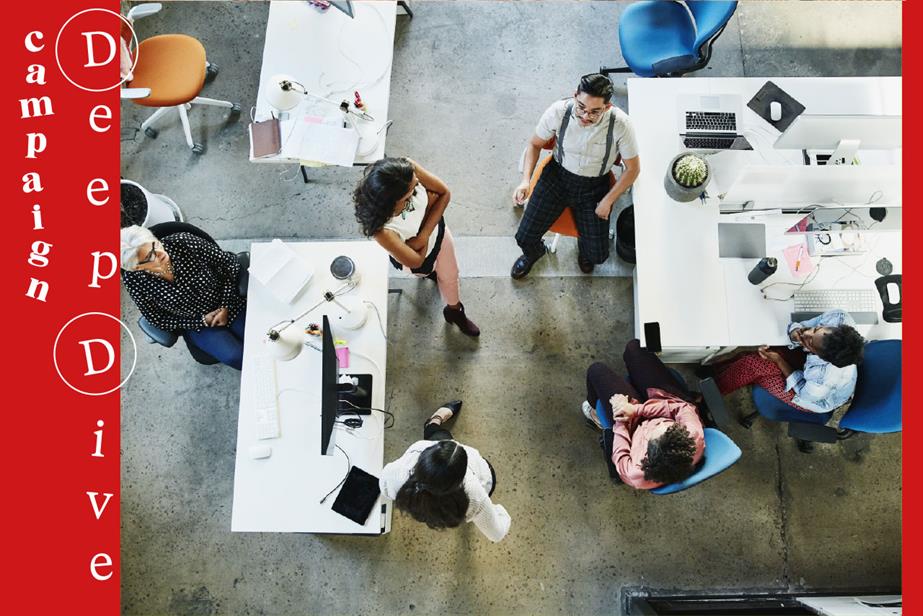 Image of an office meeting taken from above