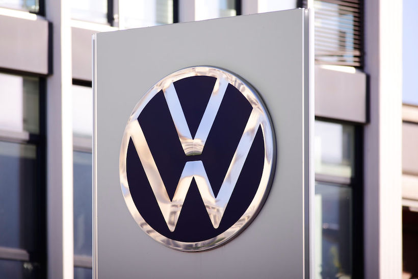 Volkswagen logo signage on corporate building