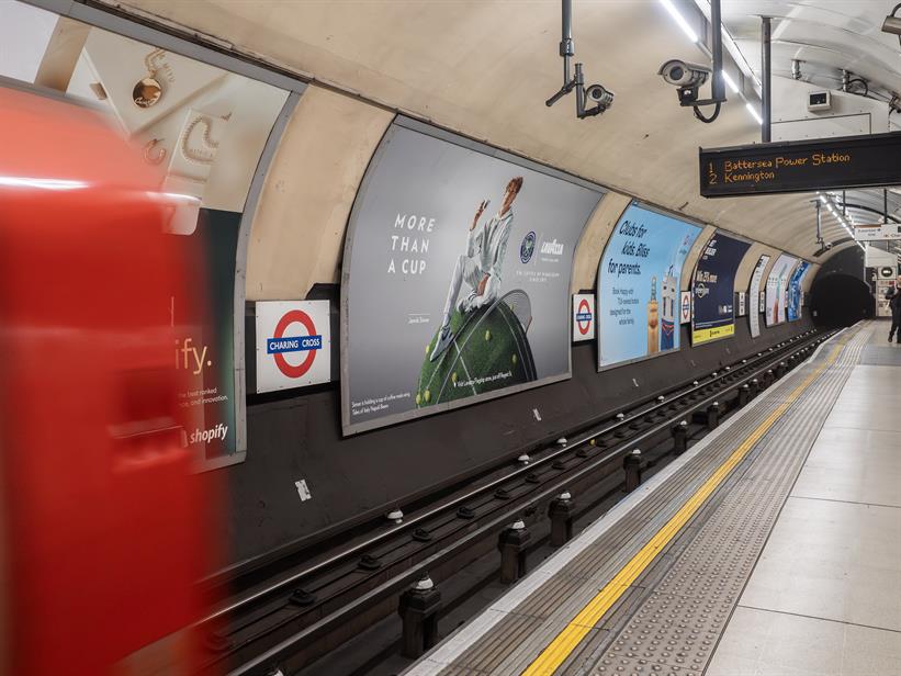 Tube platform featuring a Lavazza billboard